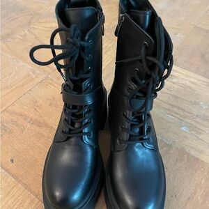 Sleek Black Leather Combat Boots